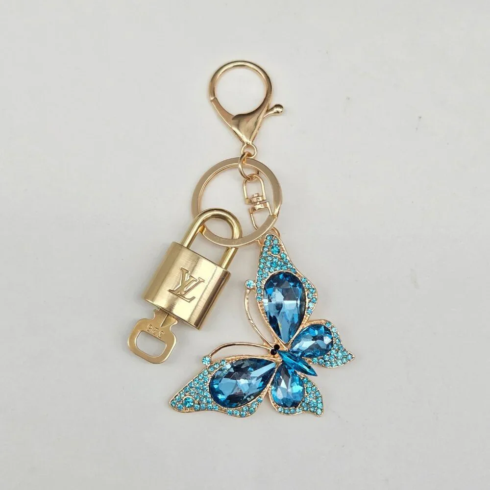LV Authentic Gold Lock & Key 🔑 Luxury Bag Charm w/ Unbranded Butterfly Keychain